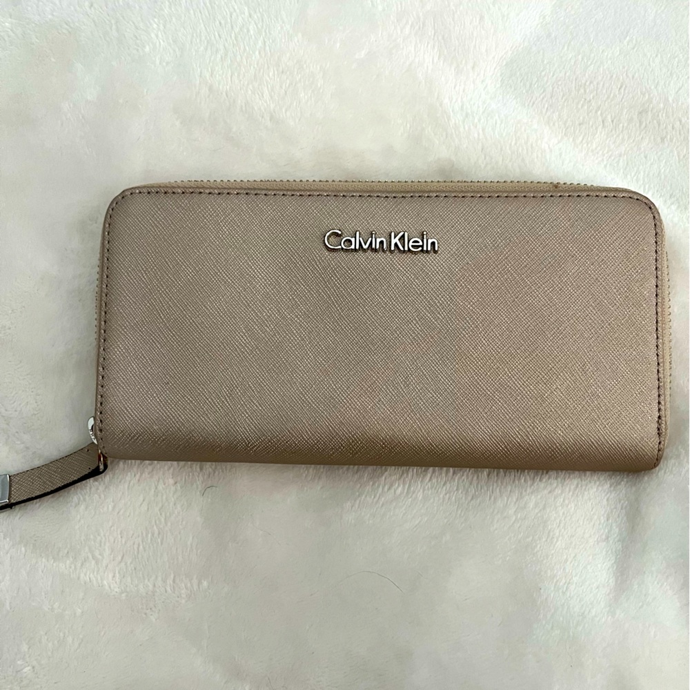Calvin Klein gold saffiano wallet.